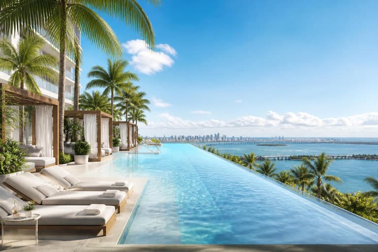 Miami luxury amenity deck with infinity pool overlooking Biscayne Bay
